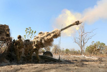 155-mm M777 howitzer  - titanium construction, digital fire control system and high-precision munitions