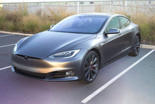 An unknown person sat on MKBHD's Tesla Model S, the hood of the electric car was bent - what is it made of?