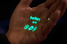 Finally something new: the startup Humane showed a wearable device with a projection screen